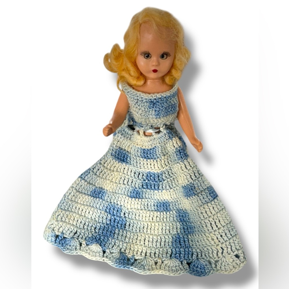 Storybook Dolls 1950’s fully articulated doll with hand knit gown.